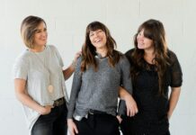 여성 건강관리, 평생을 위한 작은 변화가 큰 차이를 만든다 3 women smiling and standing beside white wall