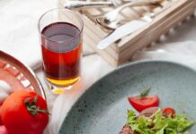 “나만의 건강 루틴, 영양제와 생활습관으로 완성하세요” meat with sliced vegetables on plate